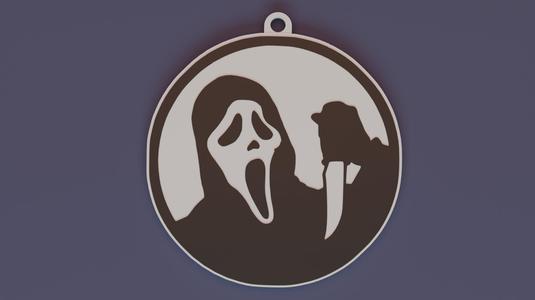 A keychain with the movie Scream on it.