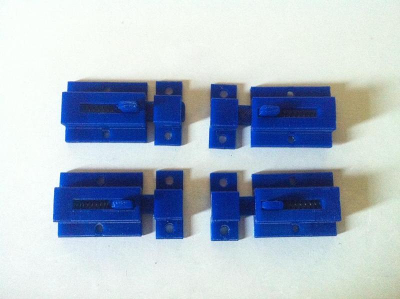 Mini spring loaded sliding latch