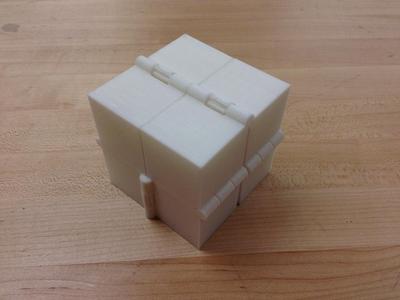 Magic Folding Cube or Eight Hinged Boxes