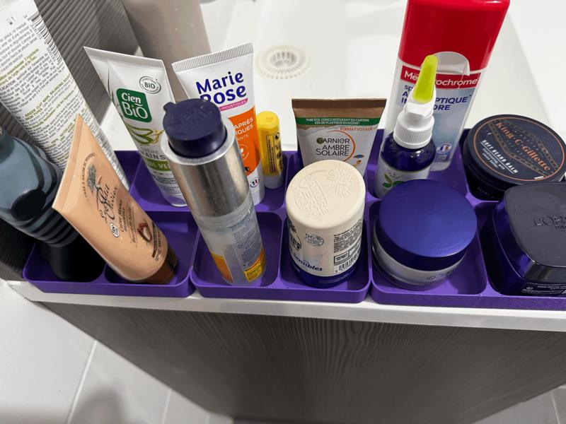 Bathroom sink side organizers