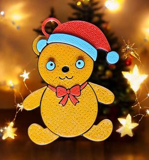 Teddy bear in a Santa hat.