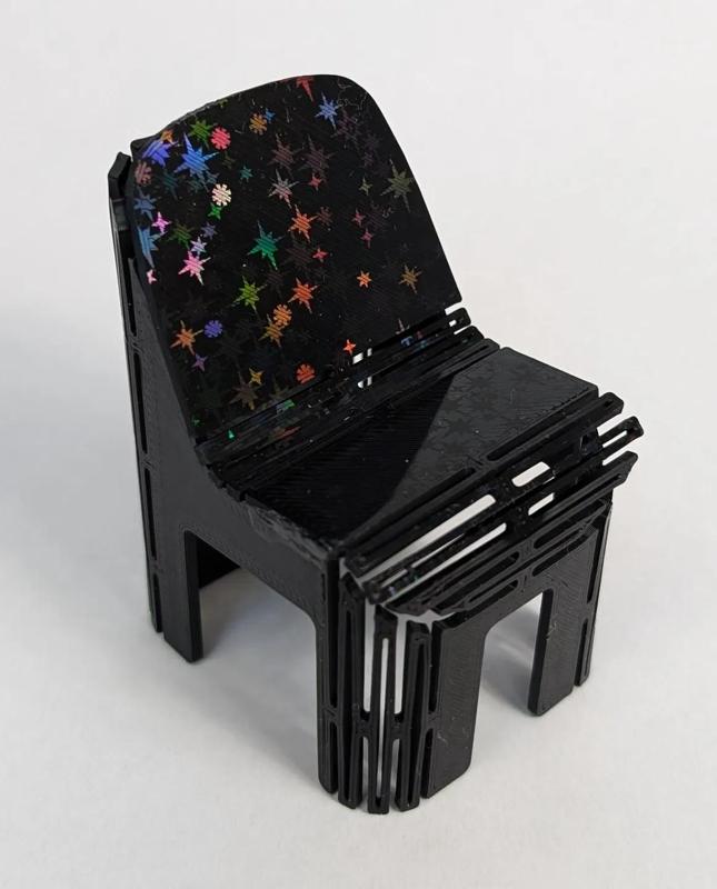 One piece compliant mechanism chair with no logo