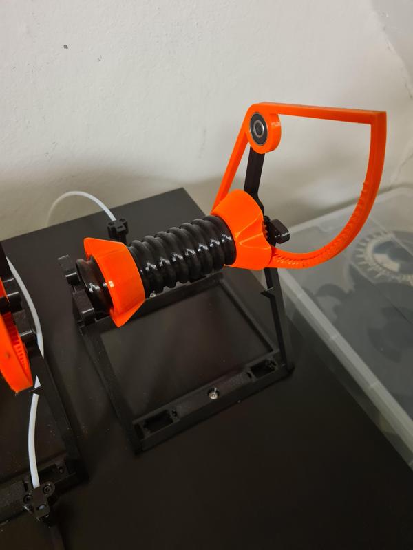 Wide auto-rewind spool holder