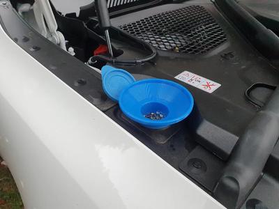 BMW i4 washer fluid funnel   