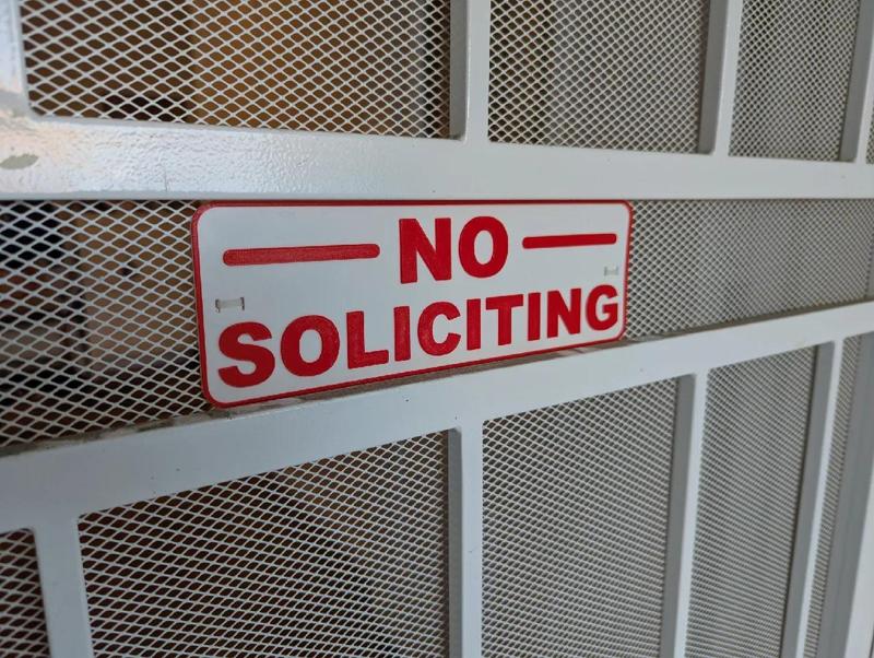 No Soliciting Sign with zip-tie slots   