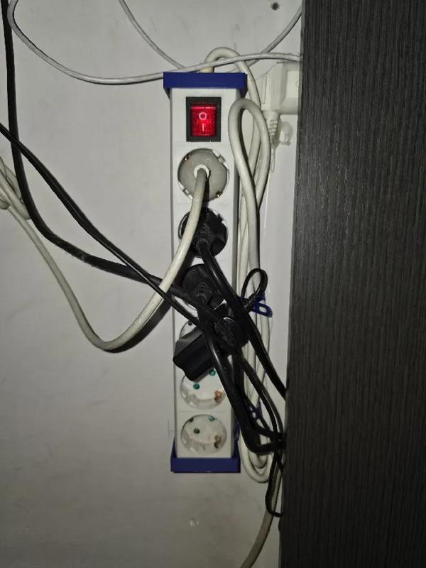 Power strip holder   