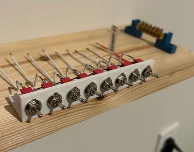 Switch board for toggle switches   