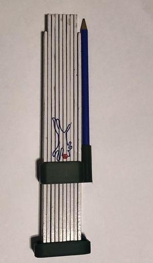 Ruler and pen holder