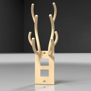 Outlet plate with deer horns