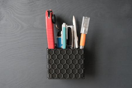 Tools, pens, pliers, tweezers, ... wall-mounted container