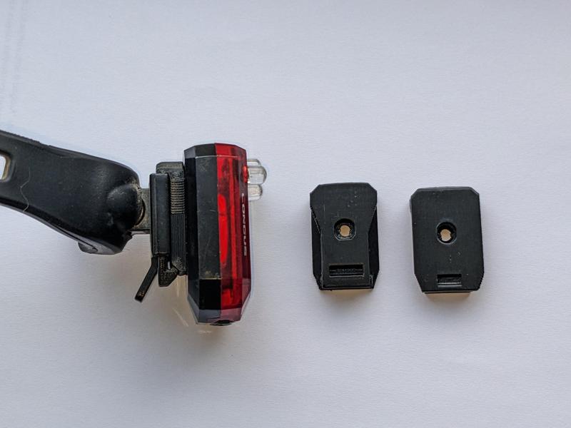 Longus bicycle tail light replacement clip (variants)