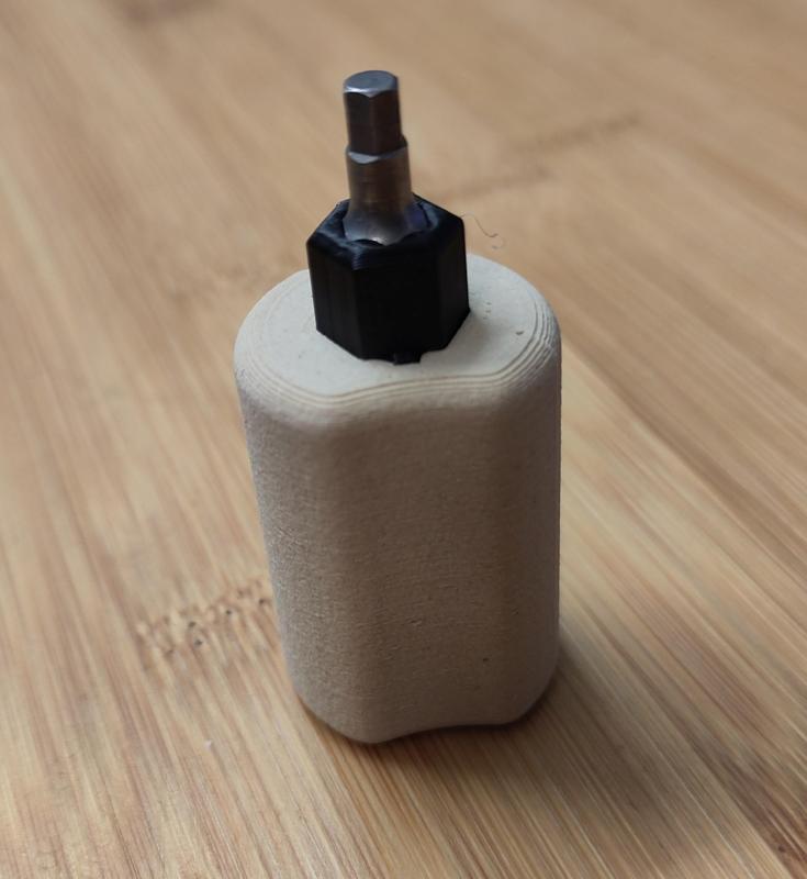 A small hex screwdriver