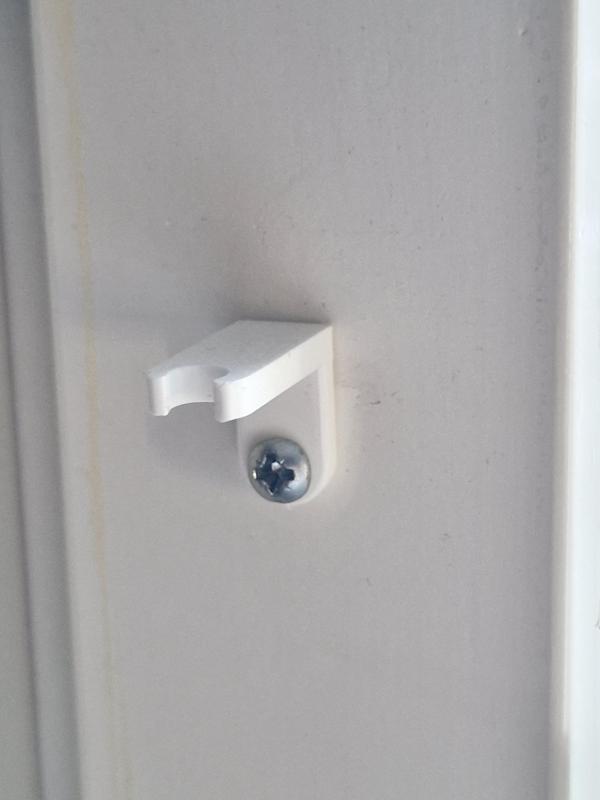 Window blinds adjuster holder