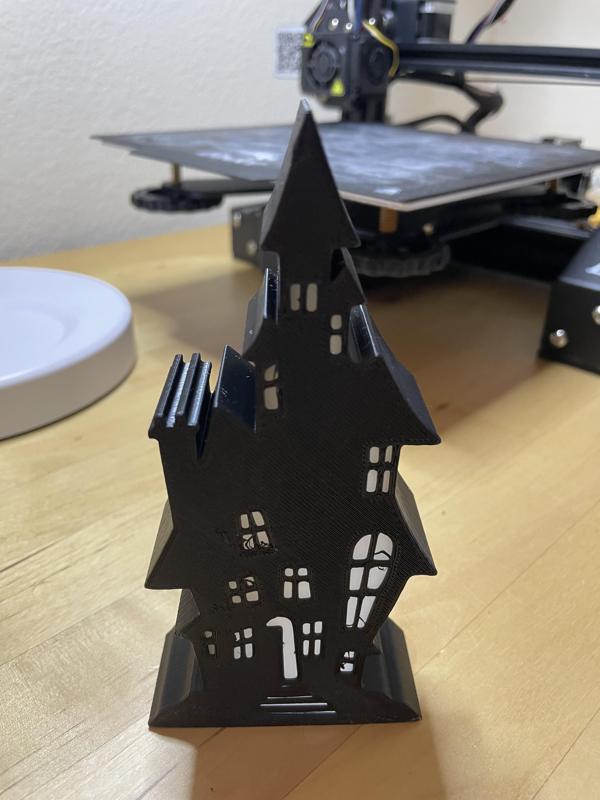 Spooky house tea light decoration