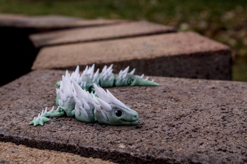 Cute multicolor articulated spikey dragon lizard