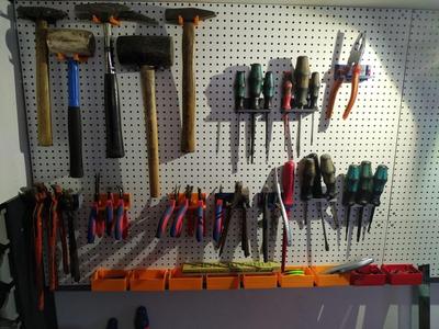 universal hook, box, tool holder  for a pegboard