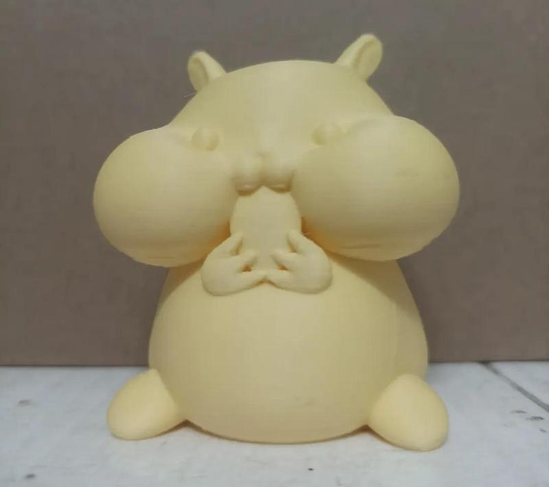 A hamster eating sunflower seeds