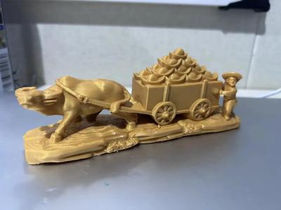 A golden ingot carriage ornament