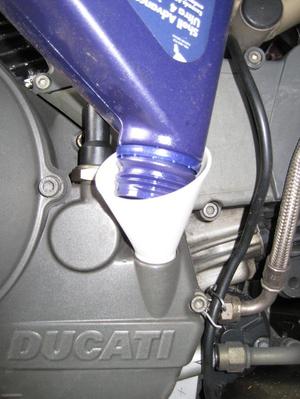 Elliptical oil funnel for Ducati