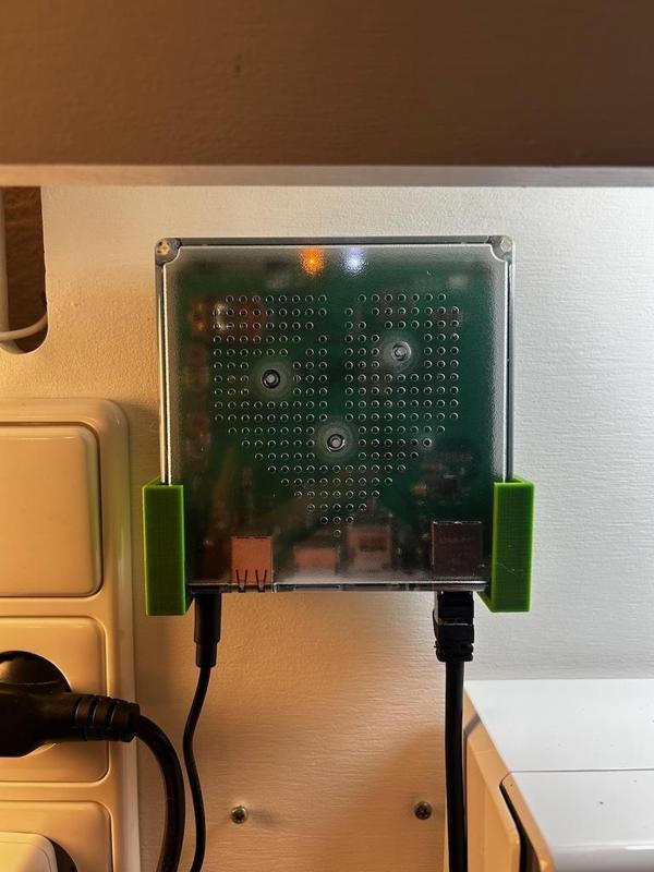 Case holder and wall mount for Home Assistant Green