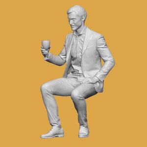 MAN SITTING WITH GLASS FOR DIORAMA