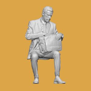 BUSINESSMAN OPENING SUITCASE FOR DIORAMA