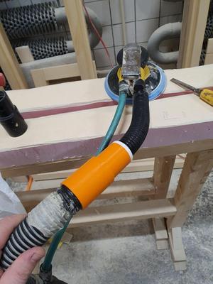 Vacuum hose rotating adapter.
