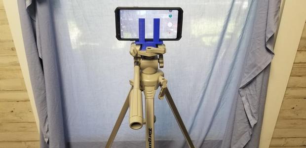 Phone tripod adapter