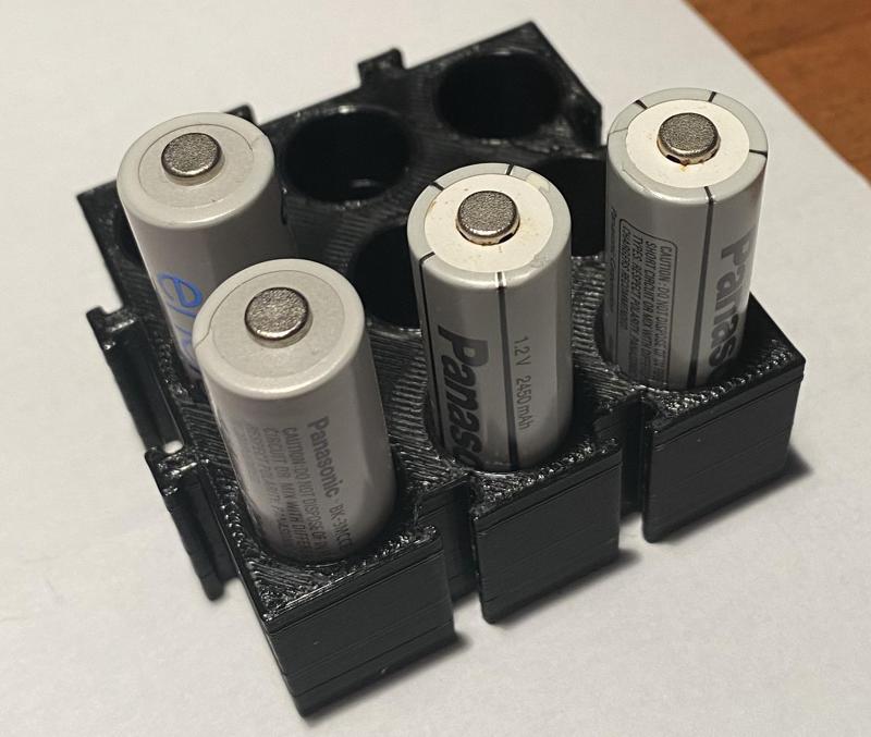 9x AA battery holder, puzzle style