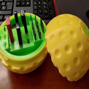 Desktop golf ball with usb, micro sd and sd holders.