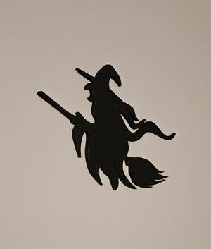 witch on a broom wall art