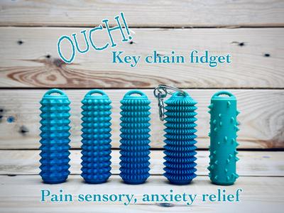 OUCH Keychain, pain seeking stim fidget