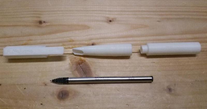 Ink pen refill holder