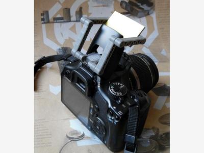 Built-in flash reflector