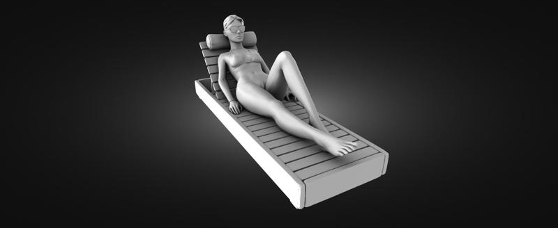 Girl on a sun lounger