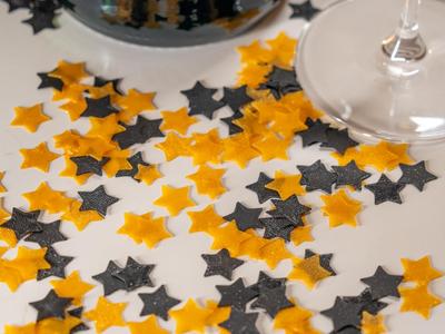 Mini star decoration for New Year dinner table