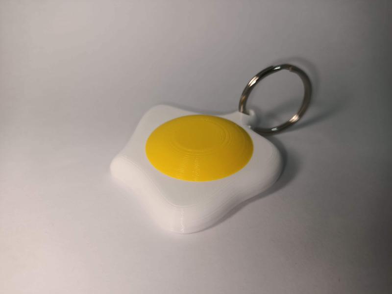 Fried egg AirTag keychain