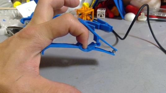 One finger tweezers