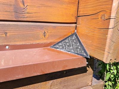 Corner water diverter, weatherprofing