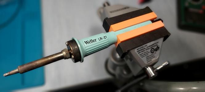 Soldering iron adapter for vise