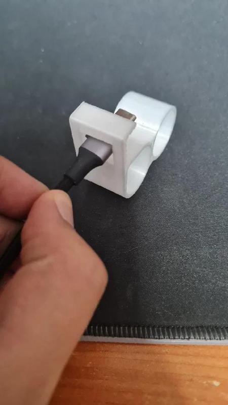 Finger phone support hook with cable hole   