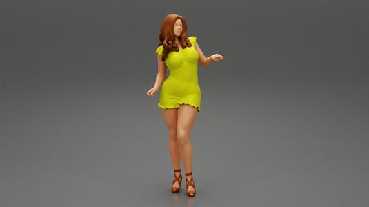 Young beautiful woman posing in a short dress