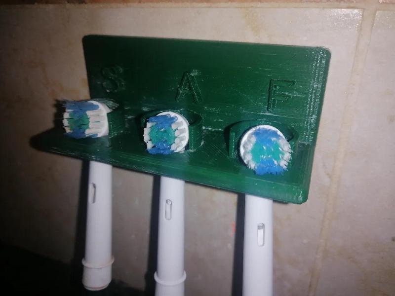 electric toothbrush head holder   