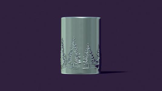 candle with a picture of fir trees