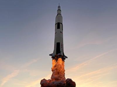 Saturn V with smoke and base