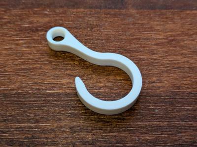 Hook with eyelet