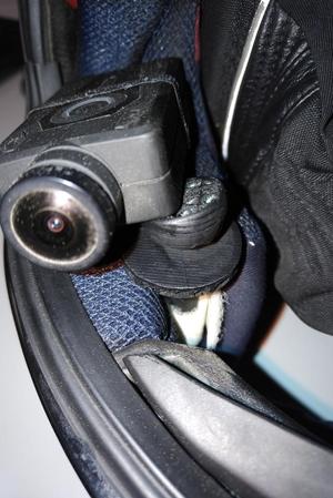 Moto helmet camera support