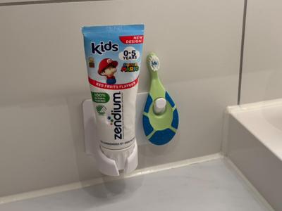 Childrens toothpase and toothbrush wall mound
