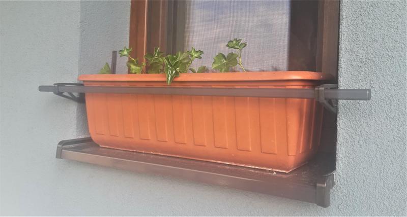Holder - railing for windowsill
