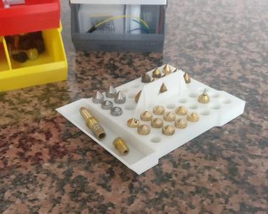 Stackable box tray for nozzles